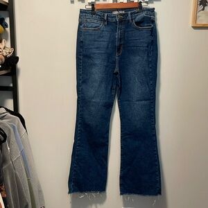 Flare jeans with frayed bottoms size 14.